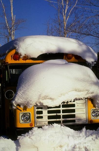 bus covered with snow